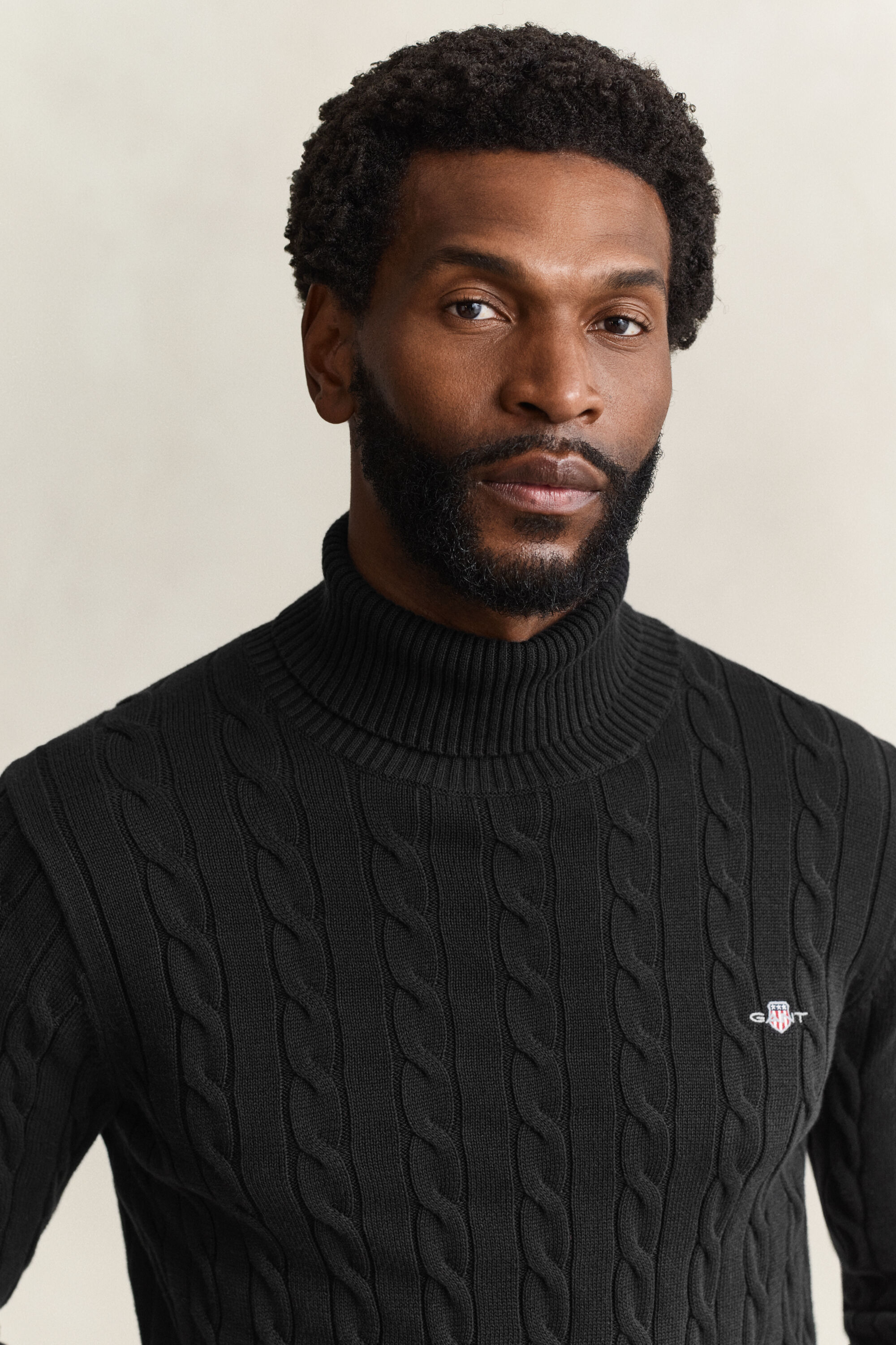 Cotton Cable Knit Turtleneck Sweater — BLACK