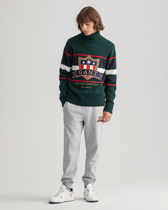 Banner Shield Turtleneck